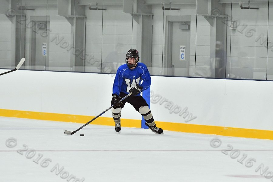 Wheaton College Men\'s Ice Hockey vs Middlesex Community College. - Photo By: KEITH NORDSTROM